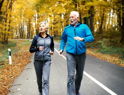 Couple jogging in forest